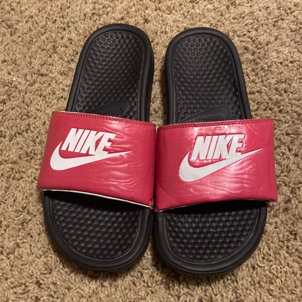 Pink Nike Slides.